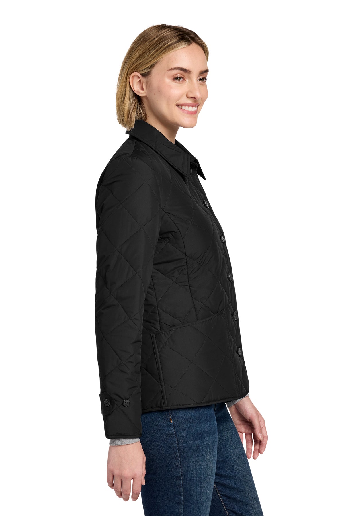 Woman wearing a black quilted jacket on a white background