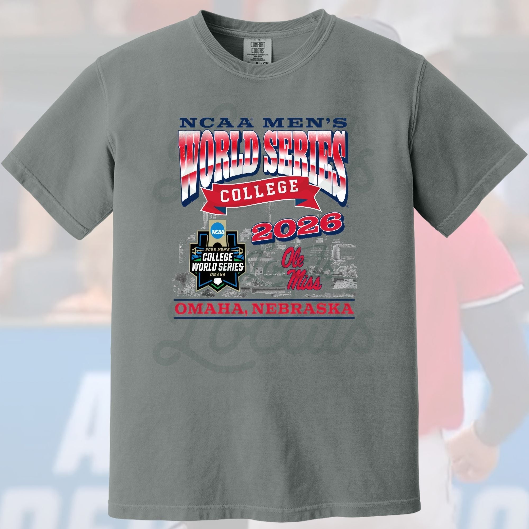 Gray t-shirt with NCAA Men's World Series College 2026 design on a blurred background