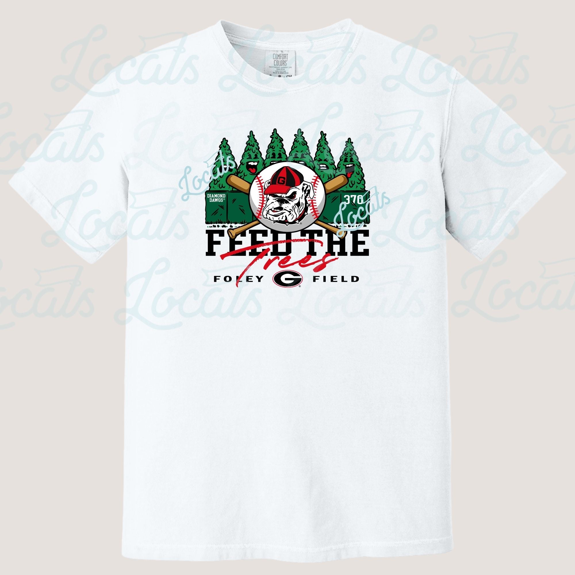 White t-shirt with graphic design featuring trees, a baseball, and text on a beige background